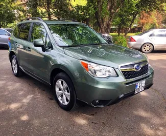 Vooraanzicht van een huurauto Subaru Forester in Tbilisi, Georgië ✓ Auto #664. ✓ Transmissie Automatisch TM ✓ 0 beoordelingen.