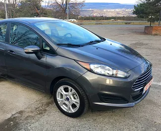 Vooraanzicht van een huurauto Ford Fiesta in Tbilisi, Georgië ✓ Auto #657. ✓ Transmissie Automatisch TM ✓ 0 beoordelingen.