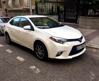 Vooraanzicht van een huurauto Toyota Corolla Sedan in Tbilisi, Georgië ✓ Auto #659. ✓ Transmissie Automatisch TM ✓ 0 beoordelingen.