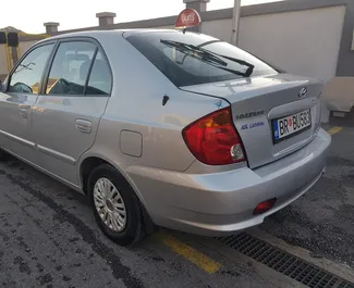 Hyundai Accent 2006 beschikbaar voor verhuur in Bar, met een kilometerlimiet van 200 km/dag.