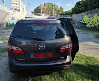 Verhuur Mazda Premacy. Comfort, Minivan Auto te huur in Cyprus ✓ Borg van Borg van 300 EUR ✓ Verzekeringsmogelijkheden TPL, CDW, SCDW, Jonge.