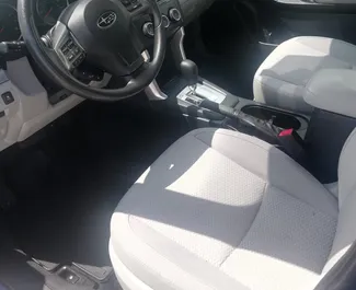 Interieur van Subaru Forester te huur in Georgië. Een geweldige auto met 5 zitplaatsen en een Automatisch transmissie.