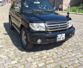 Mitsubishi Pajero Io 2008 beschikbaar voor verhuur in Tbilisi, met een kilometerlimiet van onbeperkt.