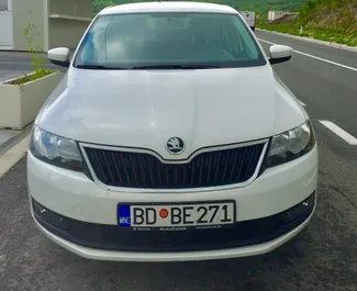 Vooraanzicht van een huurauto Skoda Rapid in Budva, Montenegro ✓ Auto #2025. ✓ Transmissie Automatisch TM ✓ 1 beoordelingen.