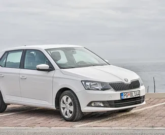 Vooraanzicht van een huurauto Skoda Fabia in Budva, Montenegro ✓ Auto #2007. ✓ Transmissie Automatisch TM ✓ 32 beoordelingen.