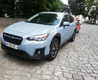 Vooraanzicht van een huurauto Subaru Crosstrek in Tbilisi, Georgië ✓ Auto #2458. ✓ Transmissie Automatisch TM ✓ 1 beoordelingen.