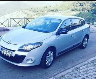 Vooraanzicht van een huurauto Renault Megane SW in Budva, Montenegro ✓ Auto #3150. ✓ Transmissie Automatisch TM ✓ 0 beoordelingen.