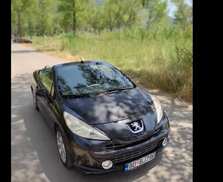 Vooraanzicht van een huurauto Peugeot 207cc in Budva, Montenegro ✓ Auto #3141. ✓ Transmissie Handmatig TM ✓ 1 beoordelingen.