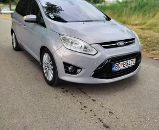 Vooraanzicht van een huurauto Ford C-Max in Budva, Montenegro ✓ Auto #3143. ✓ Transmissie Handmatig TM ✓ 0 beoordelingen.