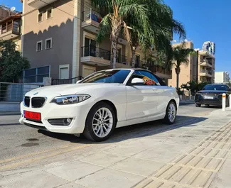 Vooraanzicht van een huurauto BMW 218i Cabrio in Limassol, Cyprus ✓ Auto #3298. ✓ Transmissie Automatisch TM ✓ 0 beoordelingen.