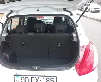 Verhuur Suzuki Swift. Economy Auto te huur in Azerbeidzjan ✓ Borg van Borg van 300 AZN ✓ Verzekeringsmogelijkheden TPL, CDW.