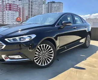 Vooraanzicht van een huurauto Ford Fusion Sedan in Bakoe, Azerbeidzjan ✓ Auto #3581. ✓ Transmissie Automatisch TM ✓ 0 beoordelingen.