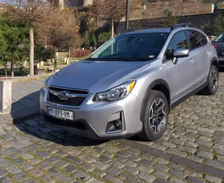 Vooraanzicht van een huurauto Subaru Crosstrek in Tbilisi, Georgië ✓ Auto #3674. ✓ Transmissie Automatisch TM ✓ 1 beoordelingen.