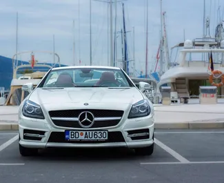 Vooraanzicht van een huurauto Mercedes-Benz SLK Cabrio in Rafailovici, Montenegro ✓ Auto #3761. ✓ Transmissie Automatisch TM ✓ 0 beoordelingen.