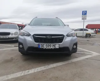 Vooraanzicht van een huurauto Subaru Crosstrek in Tbilisi, Georgië ✓ Auto #3852. ✓ Transmissie Automatisch TM ✓ 1 beoordelingen.