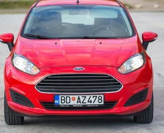 Vooraanzicht van een huurauto Ford Fiesta in Budva, Montenegro ✓ Auto #4095. ✓ Transmissie Automatisch TM ✓ 1 beoordelingen.