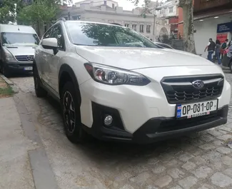 Vooraanzicht van een huurauto Subaru Crosstrek in Tbilisi, Georgië ✓ Auto #4160. ✓ Transmissie Automatisch TM ✓ 1 beoordelingen.