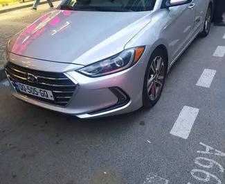 Vooraanzicht van een huurauto Hyundai Elantra in Tbilisi, Georgië ✓ Auto #4166. ✓ Transmissie Automatisch TM ✓ 0 beoordelingen.