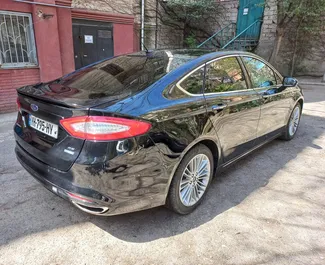 Ford Fusion Sedan 2017 beschikbaar voor verhuur op de luchthaven van Tbilisi, met een kilometerlimiet van onbeperkt.