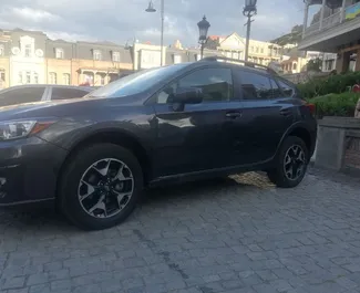 Vooraanzicht van een huurauto Subaru Crosstrek in Tbilisi, Georgië ✓ Auto #4244. ✓ Transmissie Automatisch TM ✓ 0 beoordelingen.