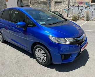 Vooraanzicht van een huurauto Honda Fit in Larnaca, Cyprus ✓ Auto #4372. ✓ Transmissie Automatisch TM ✓ 2 beoordelingen.