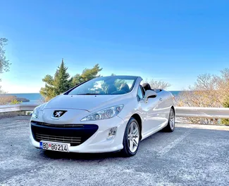 Vooraanzicht van een huurauto Peugeot 308cc in Budva, Montenegro ✓ Auto #4394. ✓ Transmissie Automatisch TM ✓ 2 beoordelingen.