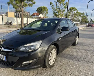 Vooraanzicht van een huurauto Opel Astra Sedan in Tirana, Albanië ✓ Auto #4717. ✓ Transmissie Handmatig TM ✓ 0 beoordelingen.