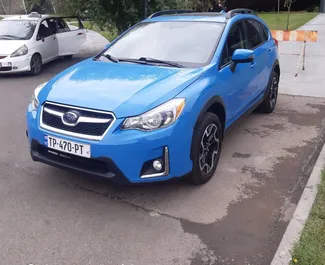 Subaru Crosstrek 2015 beschikbaar voor verhuur in Tbilisi, met een kilometerlimiet van onbeperkt.