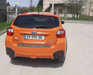 Subaru Crosstrek 2015 beschikbaar voor verhuur in Tbilisi, met een kilometerlimiet van onbeperkt.