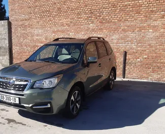 Vooraanzicht van een huurauto Subaru Forester in Tbilisi, Georgië ✓ Auto #4888. ✓ Transmissie Automatisch TM ✓ 3 beoordelingen.