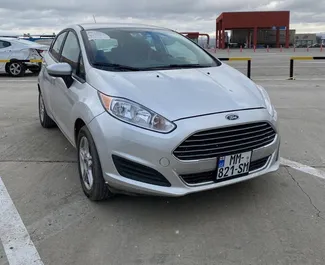 Vooraanzicht van een huurauto Ford Fiesta in Tbilisi, Georgië ✓ Auto #4877. ✓ Transmissie Automatisch TM ✓ 0 beoordelingen.