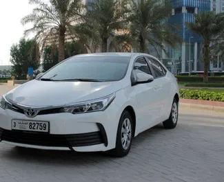 Vooraanzicht van een huurauto Toyota Corolla Sedan in Dubai, Verenigde Arabische Emiraten ✓ Auto #4861. ✓ Transmissie Automatisch TM ✓ 0 beoordelingen.