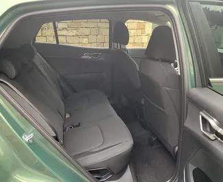 Interieur van Kia Sportage te huur in Georgië. Een geweldige auto met 5 zitplaatsen en een Automatisch transmissie.