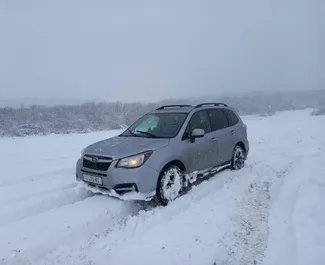 Vooraanzicht van een huurauto Subaru Forester in Tbilisi, Georgië ✓ Auto #5518. ✓ Transmissie Automatisch TM ✓ 1 beoordelingen.