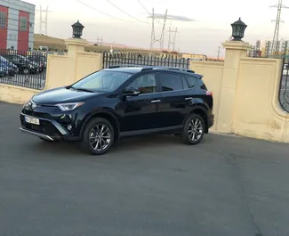 Vooraanzicht van een huurauto Toyota Rav4 L in Tbilisi, Georgië ✓ Auto #5475. ✓ Transmissie Automatisch TM ✓ 0 beoordelingen.