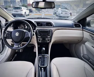 Verhuur Suzuki Ciaz. Economy, Comfort Auto te huur in de VAE ✓ Borg van Borg van 1500 AED ✓ Verzekeringsmogelijkheden TPL, CDW, SCDW, Passagiers, Diefstal, Geen storting.