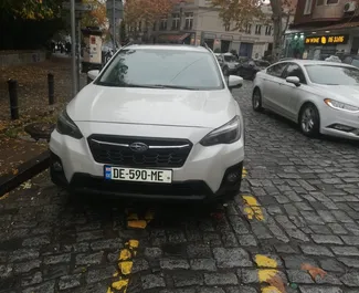 Vooraanzicht van een huurauto Subaru Crosstrek in Tbilisi, Georgië ✓ Auto #6263. ✓ Transmissie Automatisch TM ✓ 0 beoordelingen.