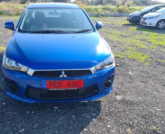 Vooraanzicht van een huurauto Mitsubishi Lancer in Limassol, Cyprus ✓ Auto #6003. ✓ Transmissie Automatisch TM ✓ 0 beoordelingen.