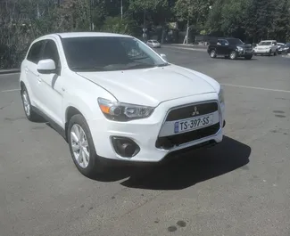 Vooraanzicht van een huurauto Mitsubishi Outlander Sport in Tbilisi, Georgië ✓ Auto #5823. ✓ Transmissie Automatisch TM ✓ 0 beoordelingen.