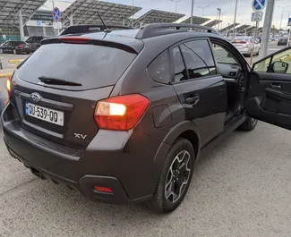 Subaru Crosstrek 2014 beschikbaar voor verhuur in Tbilisi, met een kilometerlimiet van onbeperkt.