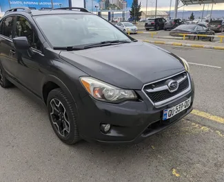 Vooraanzicht van een huurauto Subaru Crosstrek in Tbilisi, Georgië ✓ Auto #5824. ✓ Transmissie Automatisch TM ✓ 0 beoordelingen.