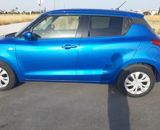 Suzuki Swift 2018 beschikbaar voor verhuur in Larnaca, met een kilometerlimiet van onbeperkt.