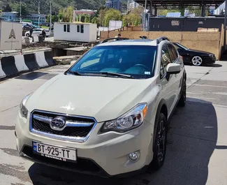 Vooraanzicht van een huurauto Subaru XV in Tbilisi, Georgië ✓ Auto #6359. ✓ Transmissie Automatisch TM ✓ 0 beoordelingen.