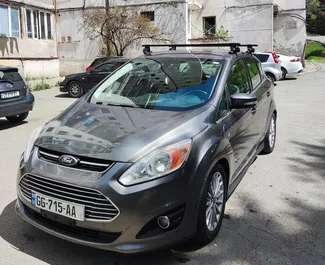 Vooraanzicht van een huurauto Ford C-Max in Tbilisi, Georgië ✓ Auto #6475. ✓ Transmissie Automatisch TM ✓ 3 beoordelingen.