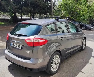 Autohuur Ford C-Max 2014 in in Georgië, met Hybride brandstof en 188 pk ➤ Vanaf 84 GEL per dag.