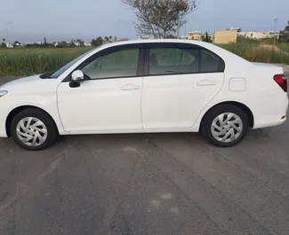 Vooraanzicht van een huurauto Toyota Corolla Axio in Larnaca, Cyprus ✓ Auto #6514. ✓ Transmissie Automatisch TM ✓ 0 beoordelingen.