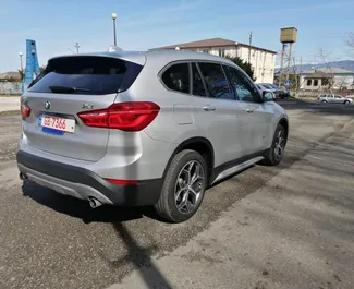 Autohuur BMW X1 2020 in in Georgië, met Benzine brandstof en 280 pk ➤ Vanaf 150 GEL per dag.