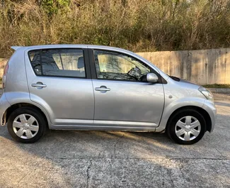 Autohuur Daihatsu Sirion 2010 in in Montenegro, met Benzine brandstof en 103 pk ➤ Vanaf 25 EUR per dag.