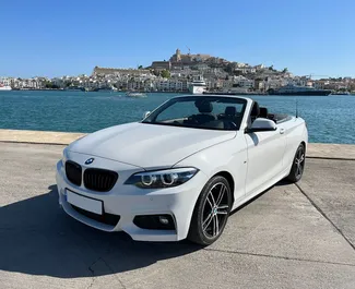 Autohuur BMW 218i Cabrio 2020 in in Spanje, met Benzine brandstof en 150 pk ➤ Vanaf 110 EUR per dag.