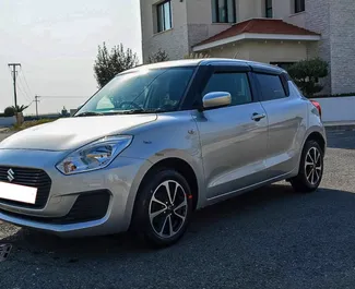 Vooraanzicht van een huurauto Suzuki Swift in Larnaca, Cyprus ✓ Auto #6812. ✓ Transmissie Automatisch TM ✓ 1 beoordelingen.